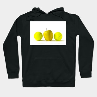 Yellow apple between tennis balls Hoodie